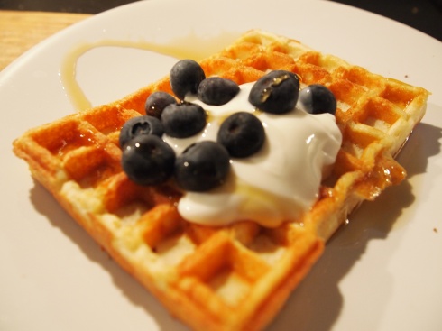 Waffles with blueberries, yoghurt and maple syrup